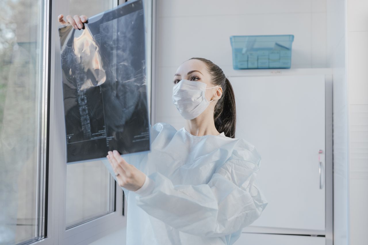 Patient being positioned for an X-ray